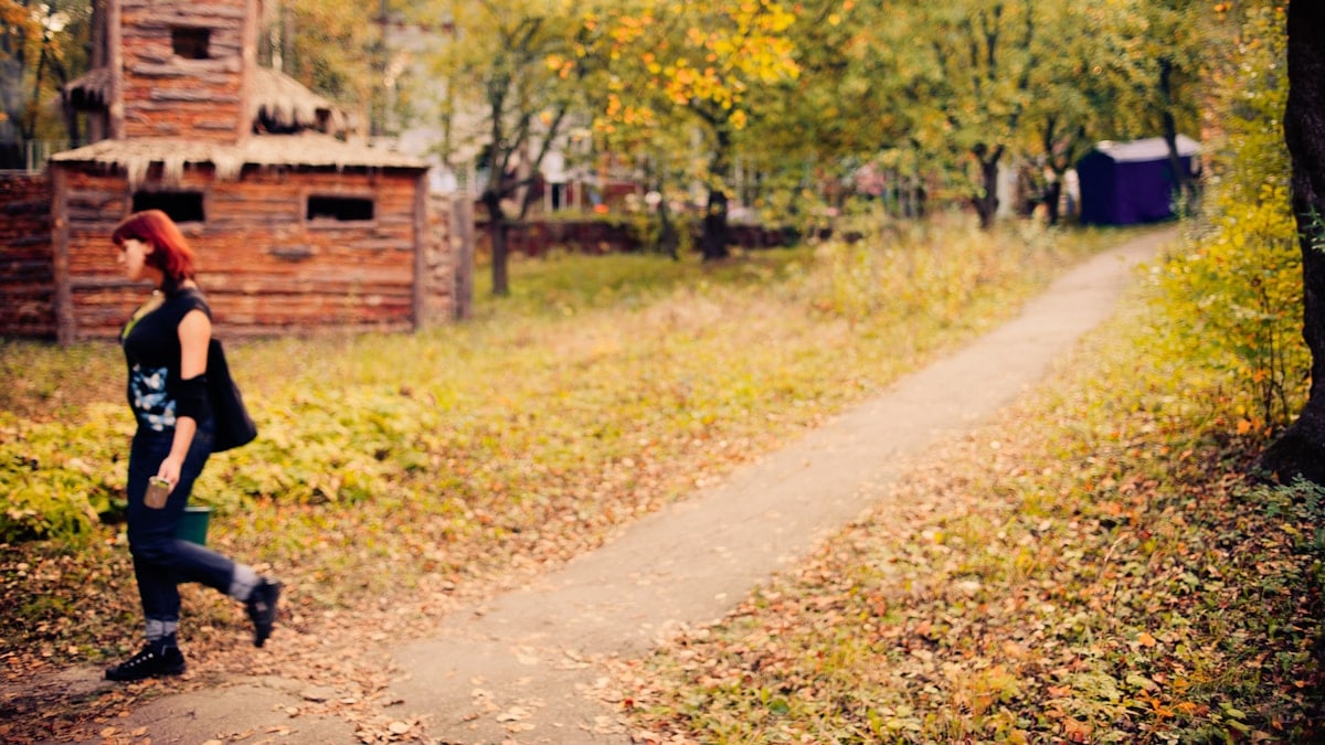 woman walks at rural area